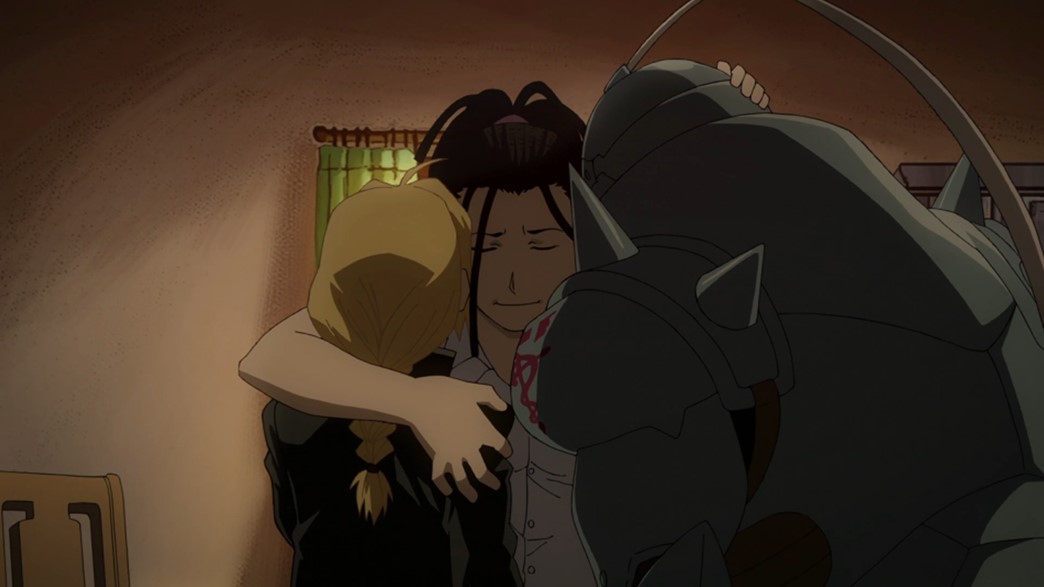 Fullmetal Alchemist Brotherhood Episode 12 Izumi hugs Edward and Alphonse