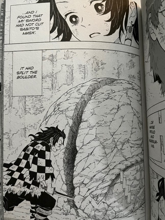 Demon Slayer Kimetsu no Yaiba Volume 1 Tanjiro cut the boulder