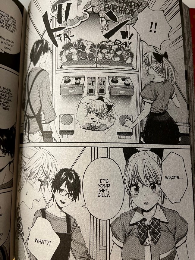 The Girl in the Arcade Volume 3 Mobuo shows Nanora her birthday present